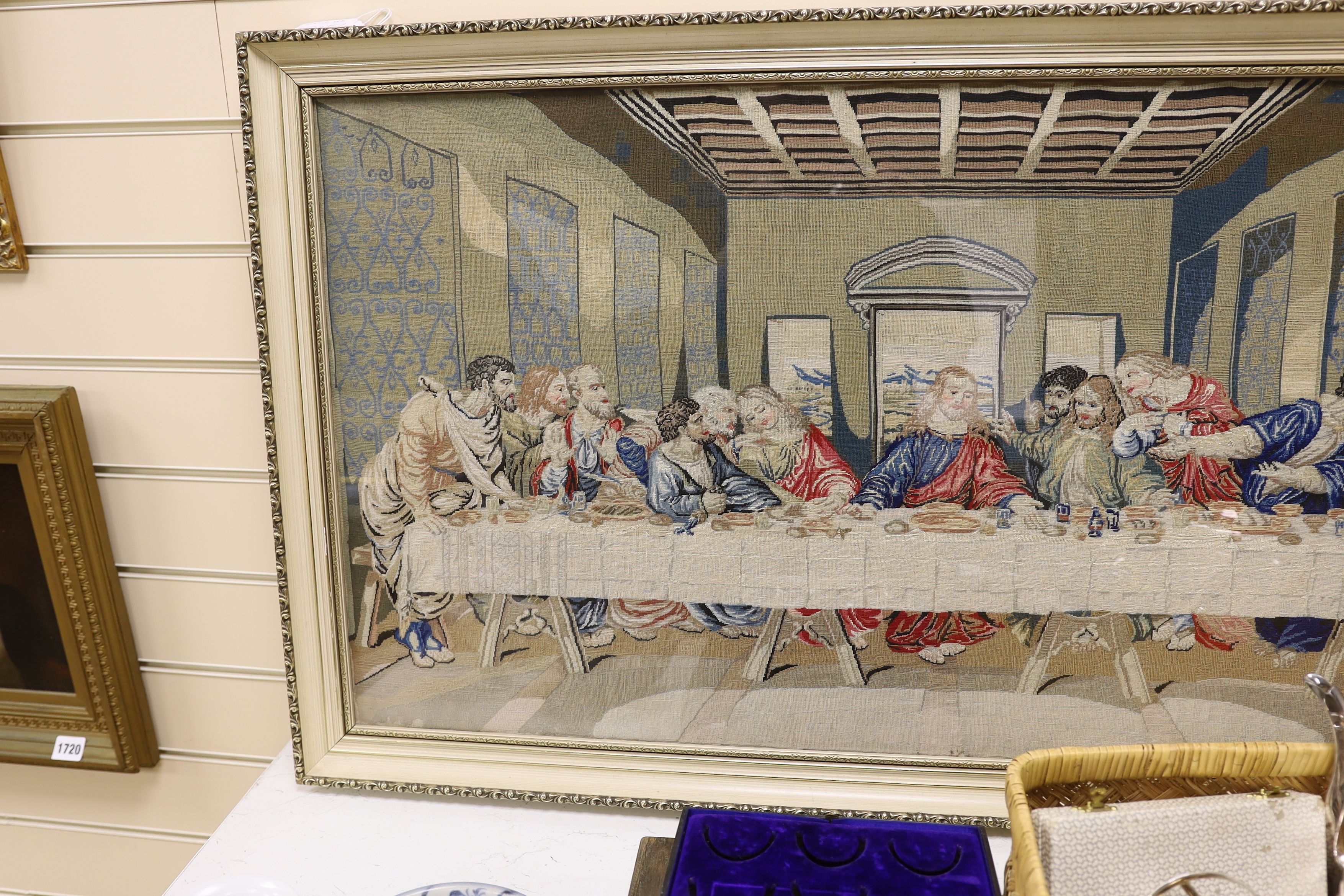 A 20th century fine petit point embroidery of 'The Last Supper', based on Leonardo Da Vinci’s oil painting, 97cm wide, 51cm high